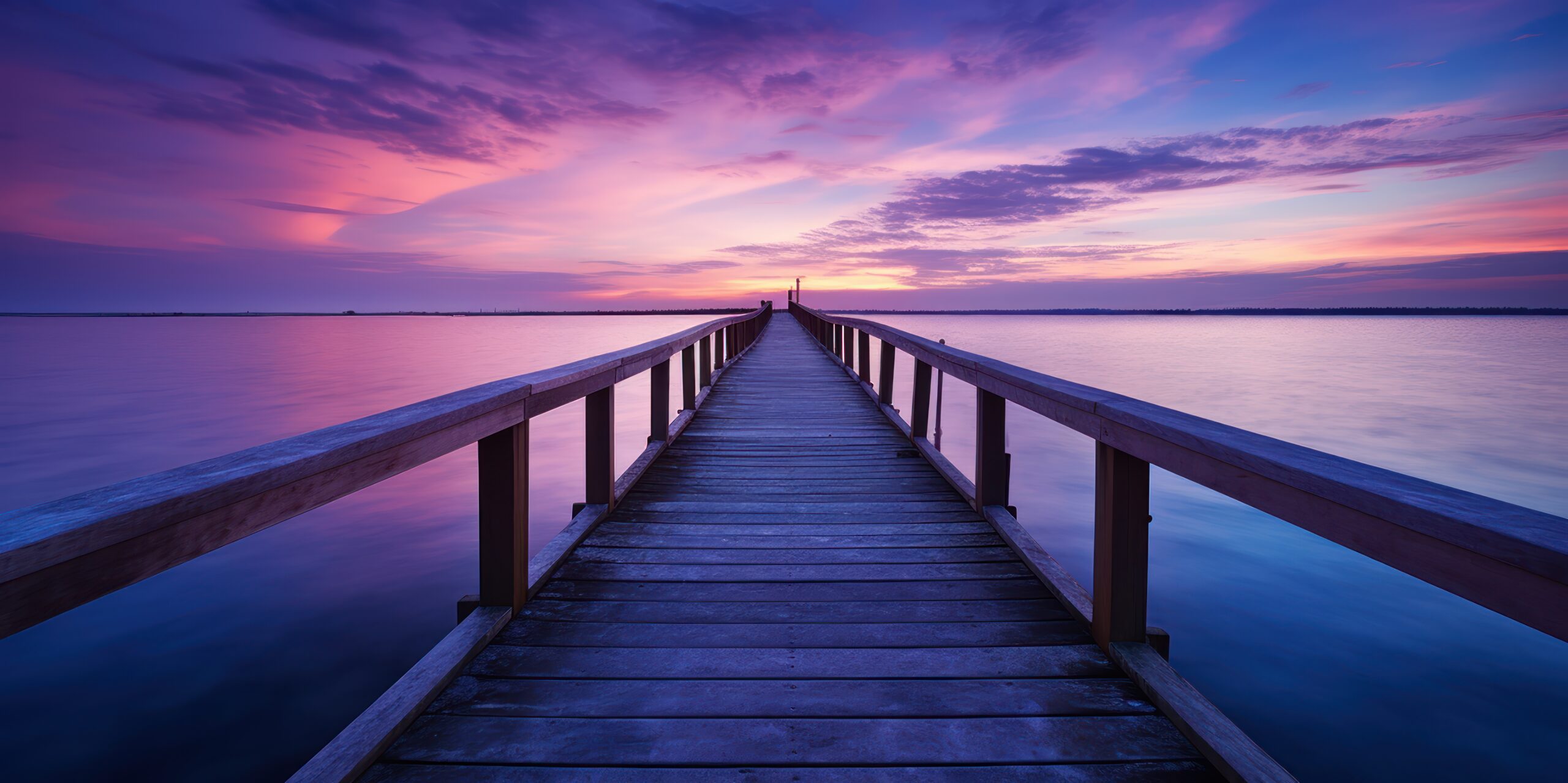 Image of a bridge with purple skies
